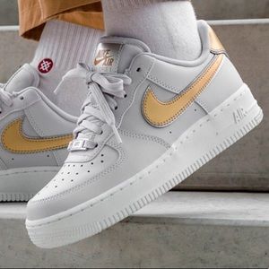 nike air force gold swoosh
